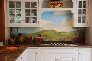 Lighting was installed and a beautiful mural was painted by a local artist as a back splash. The entire wall is coated with a sealant so splashes and spatters wipe right off.